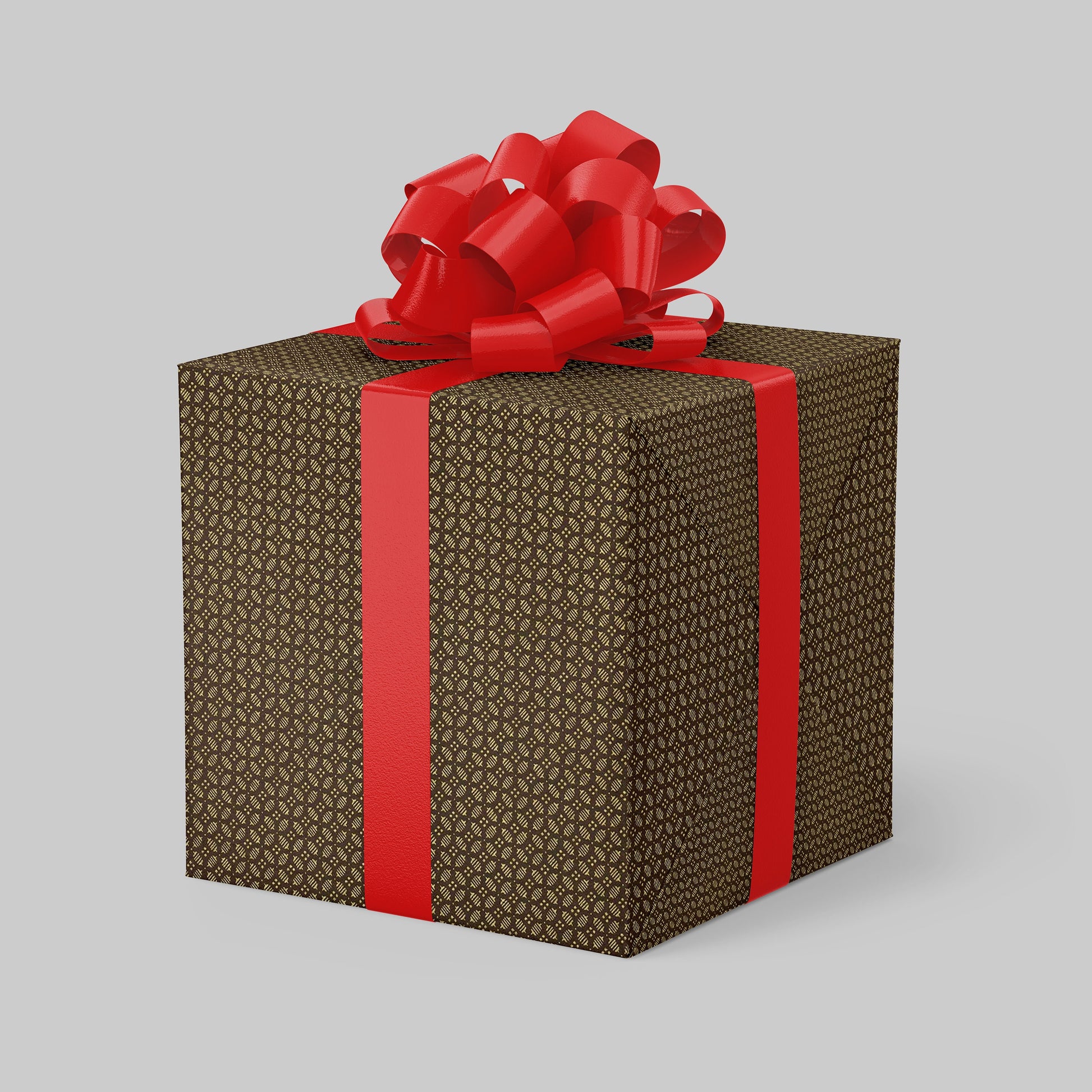 Gift box wrapped with chiyogami paper with brown pattern and red ribbon on a light gray background