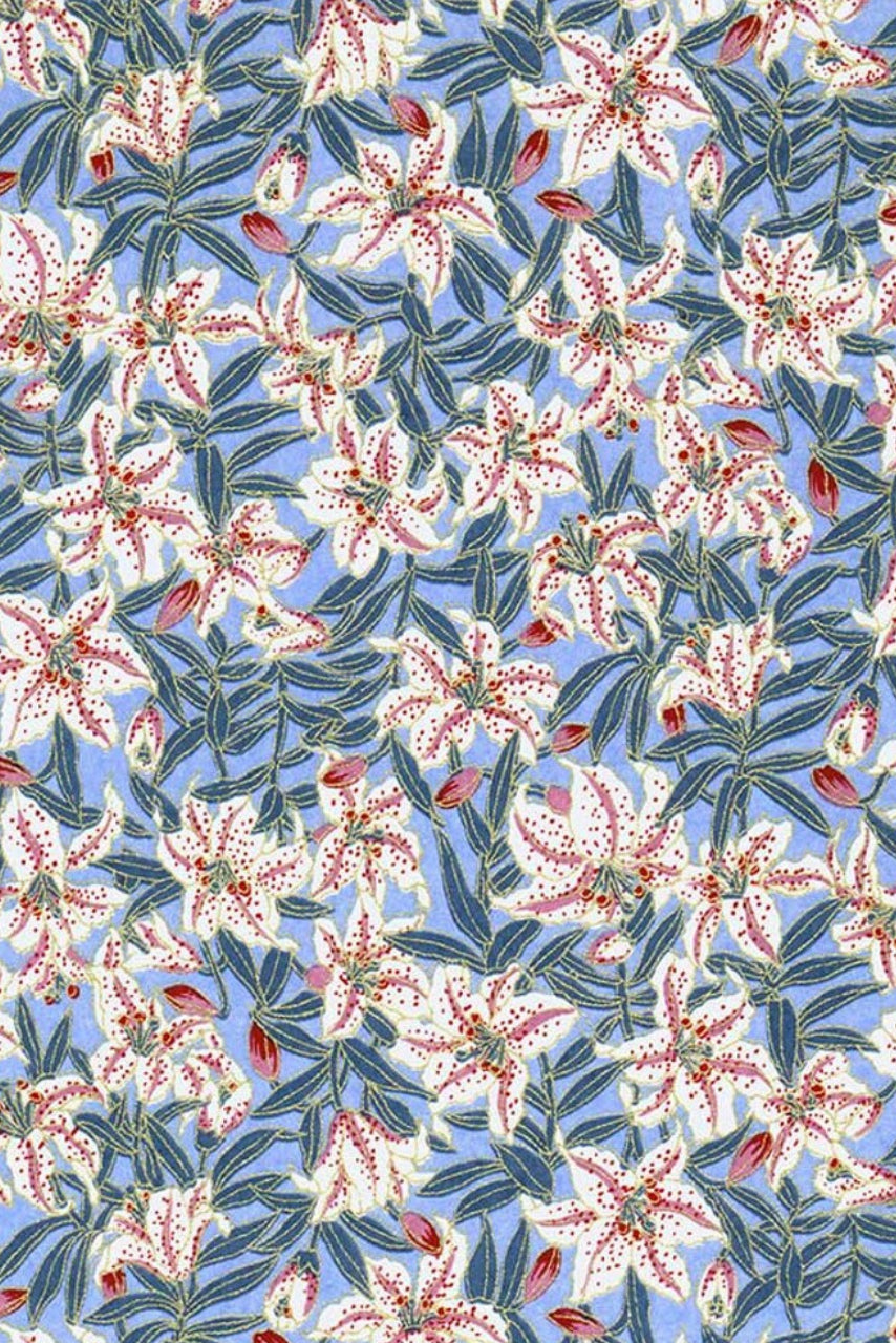 Chiyogami paper with Floral pattern with white flowers and green leaves on a blue background