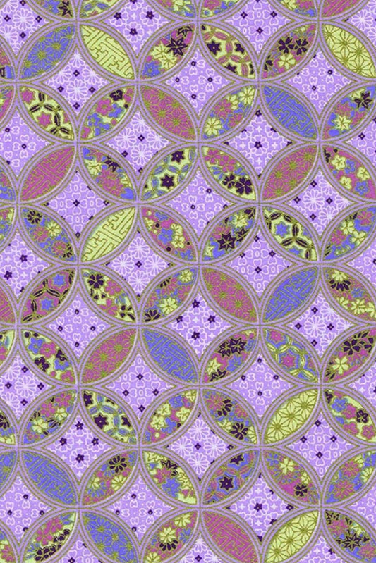 Patterned chiyogami paper with a geometric design on a purple background