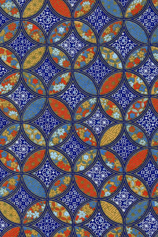 Patterned chiyogami paper with blue, orange, and green colors