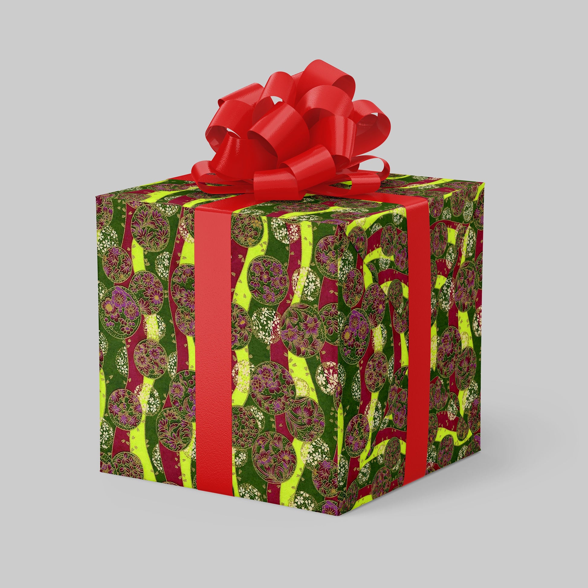 Gift box with green and red pattern and a large red bow on a gray background