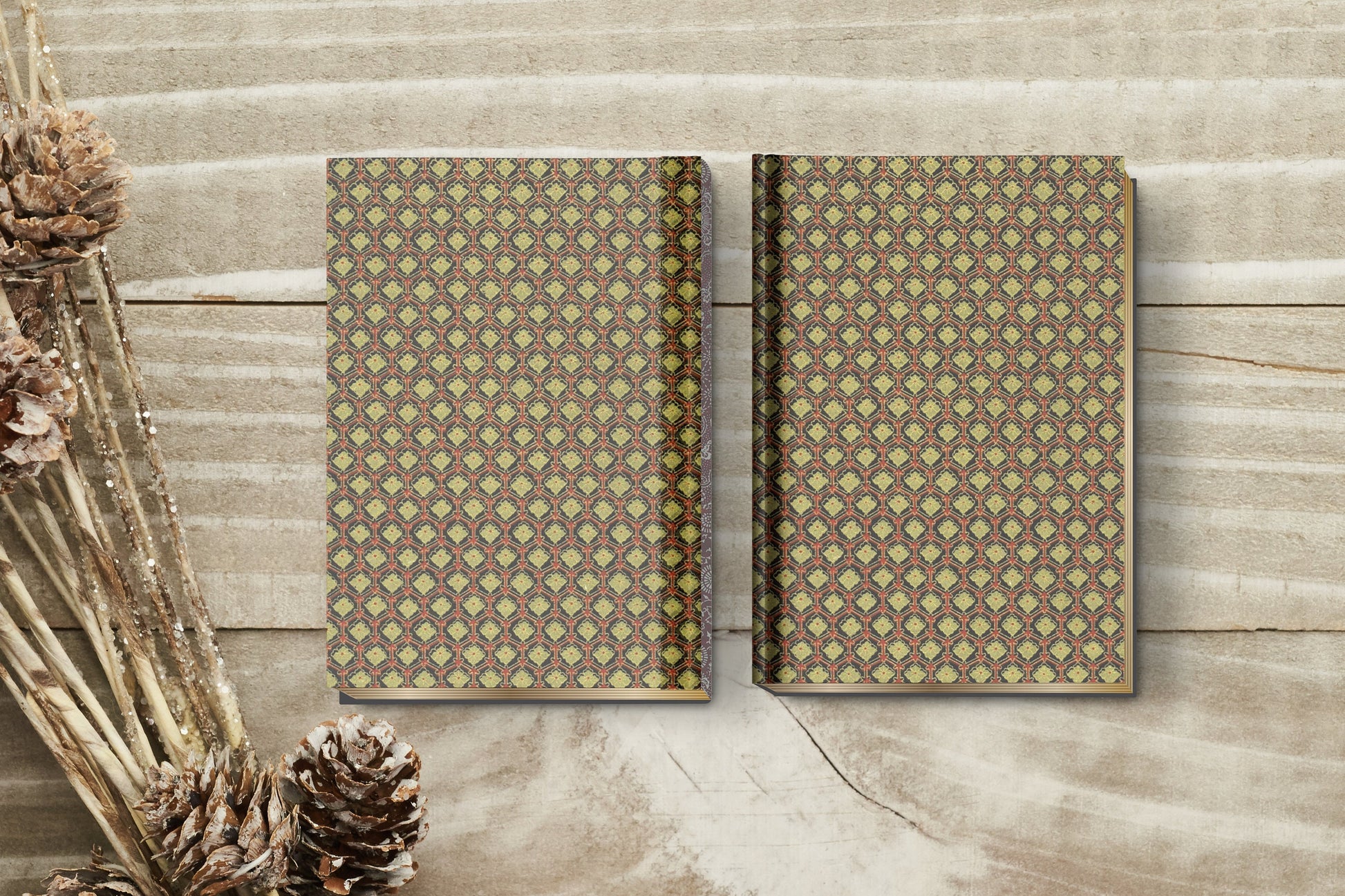 Two book with geometric pattern made with chiyogami paper in a bookbinding project.