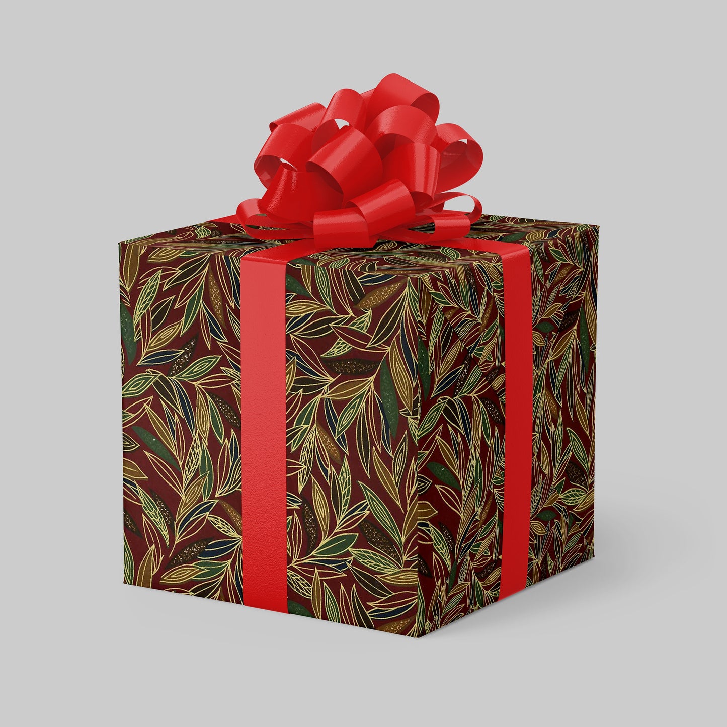 Gift box with leaf pattern and red ribbon on a gray background