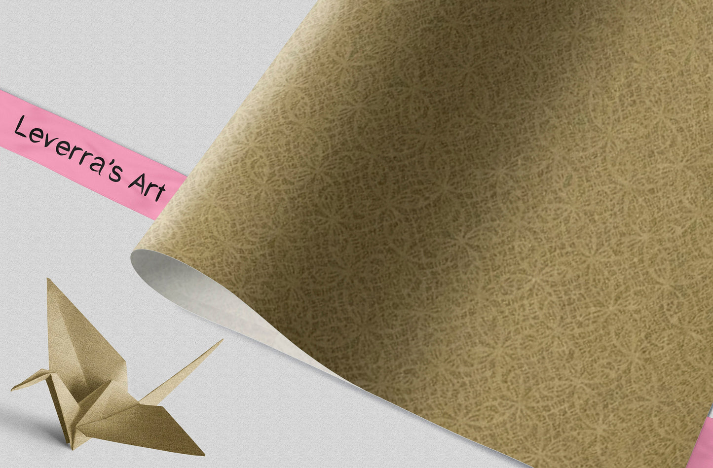 Gold textured chiyogami paper with a pink strip and origami crane on a light gray background, featuring 'Leverra's Art' branding.