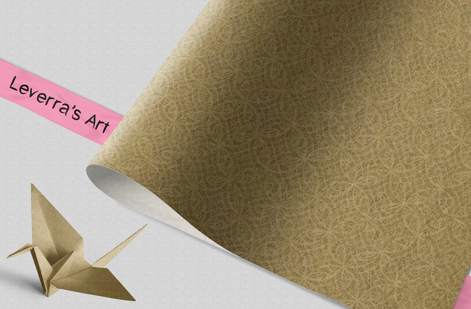 Gold textured chiyogami paper with a pink strip and origami crane on a light gray background, featuring 'Leverra's Art' branding.