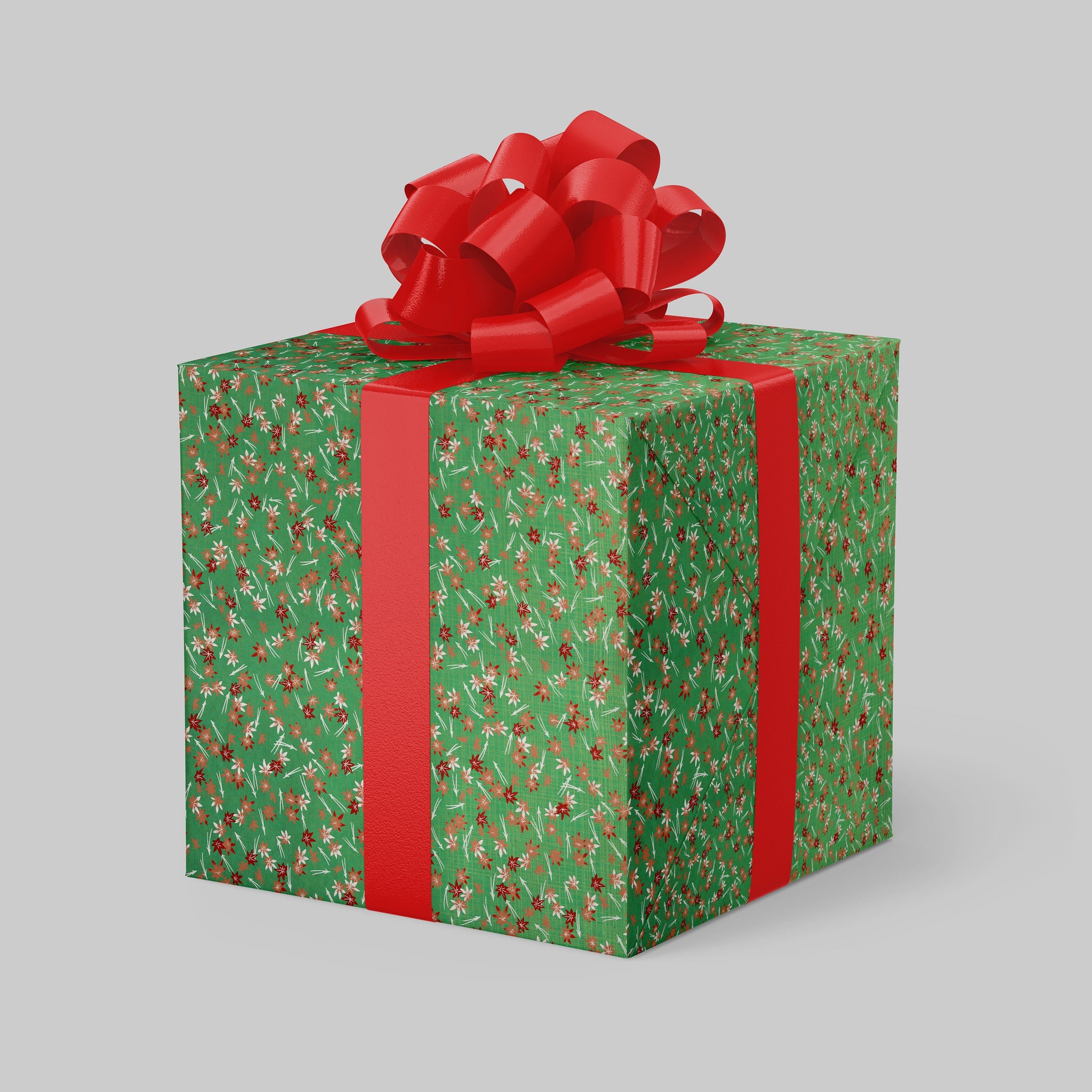 Green gift wrapped with chiyogami paper box with red ribbon and bow on a gray background