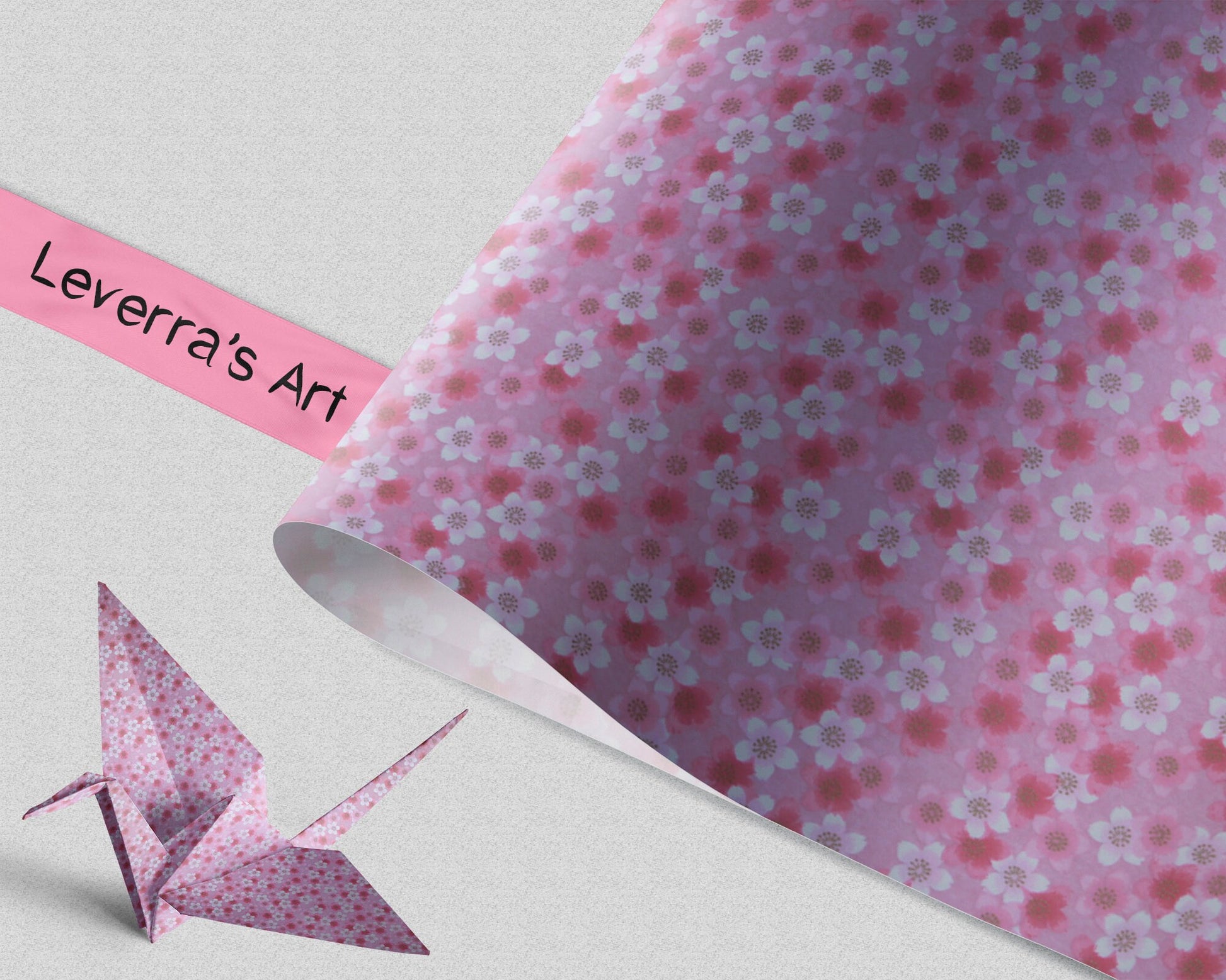 Floral patterned chiyogami paper with a pink origami crane and 'Leverra's Art' label.