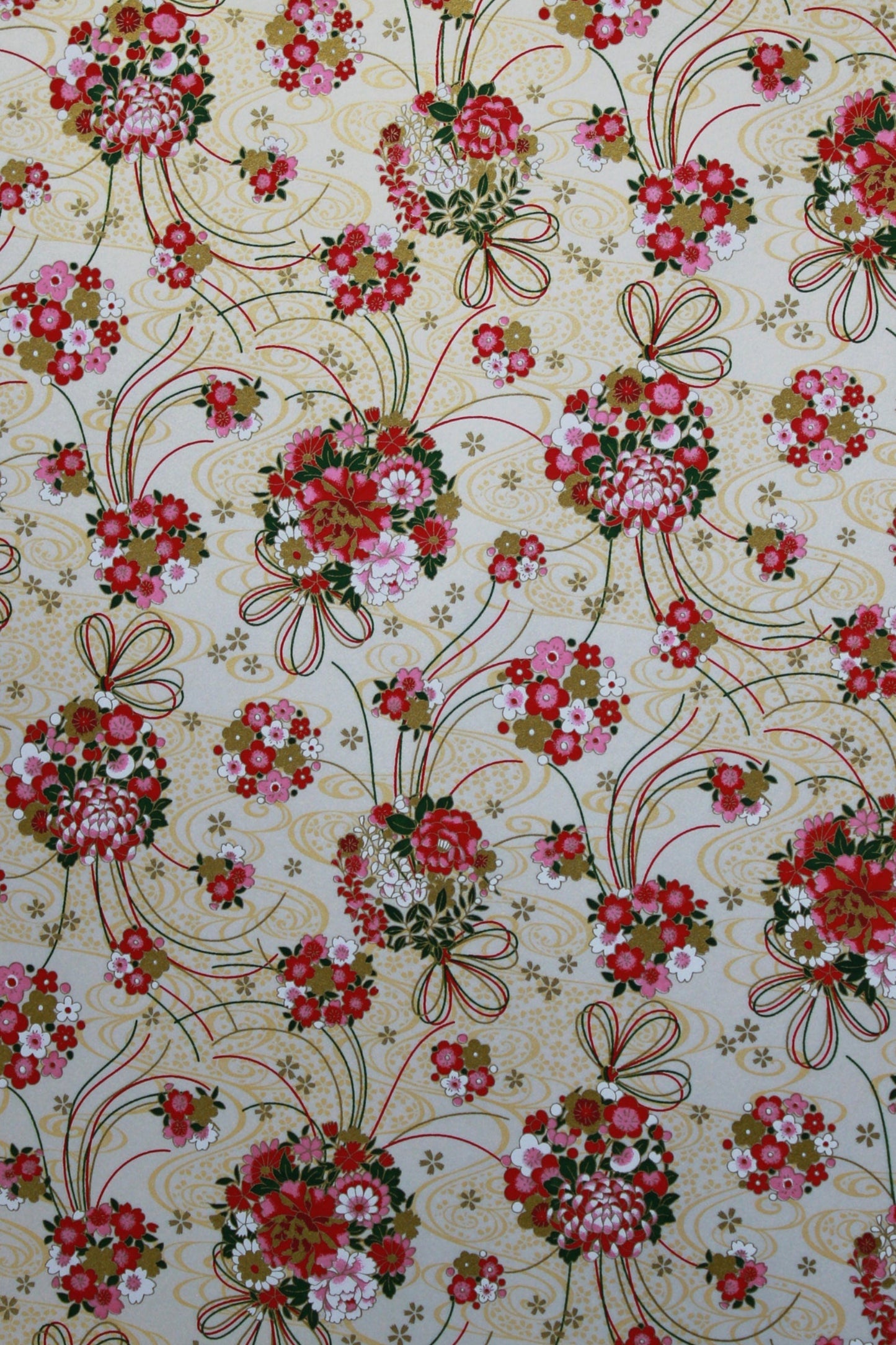 Floral and bow pattern on a beige background