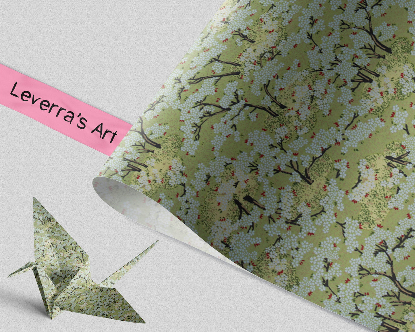 Green floral patterned paper with a pink tape label reading 'Leverra's Art' on a white background.