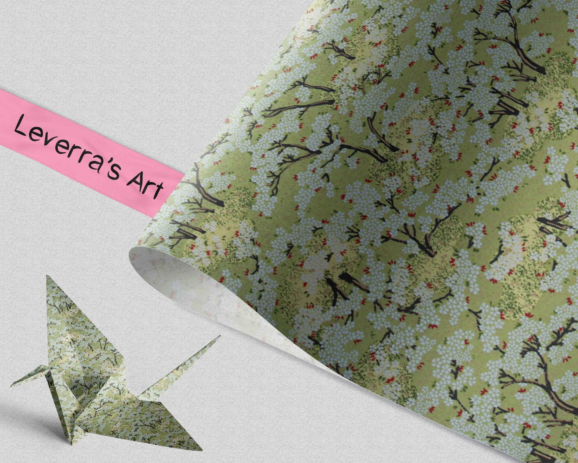 Green floral patterned paper with a pink tape label reading 'Leverra's Art' on a white background.