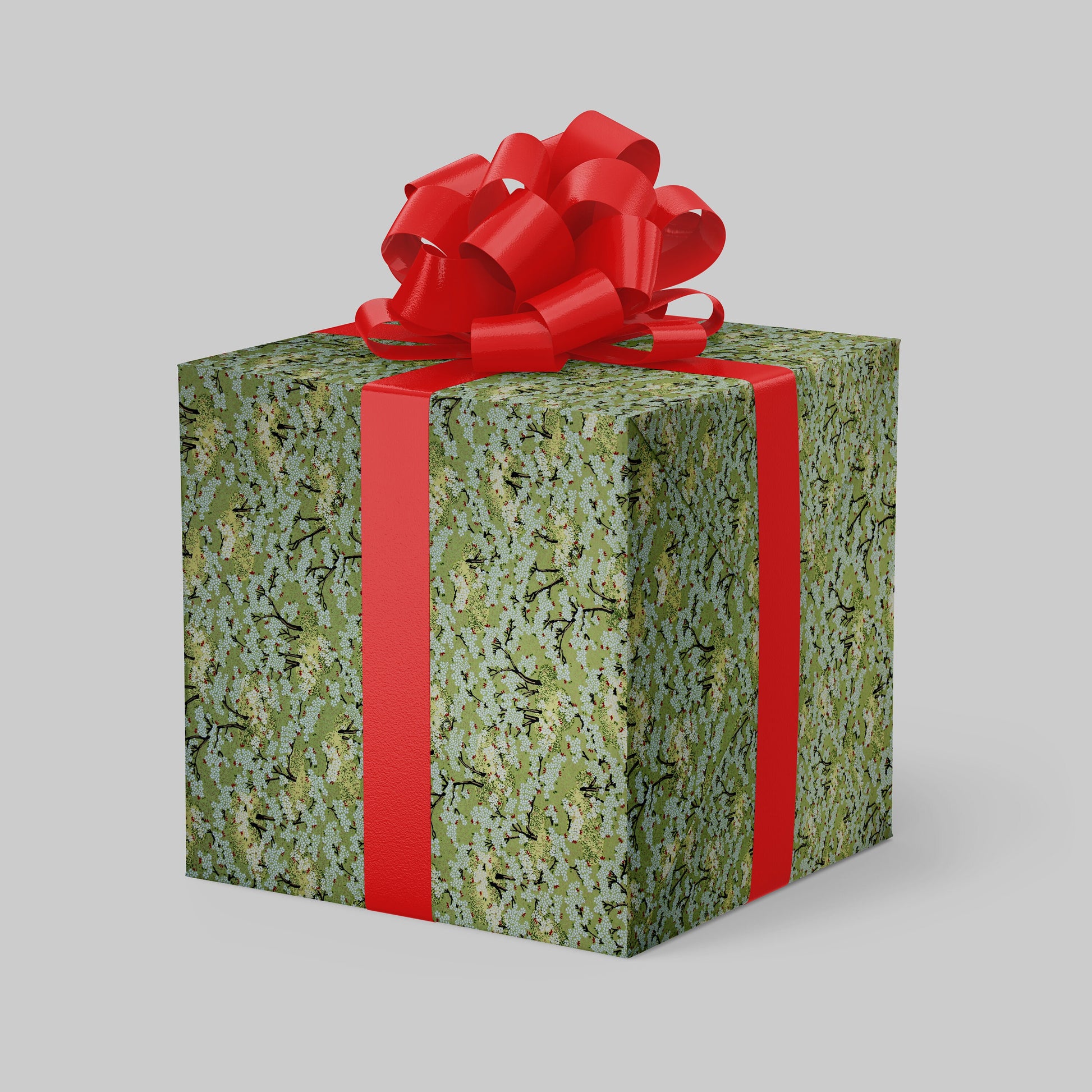 Gift box with green pattern and red ribbon on a gray background