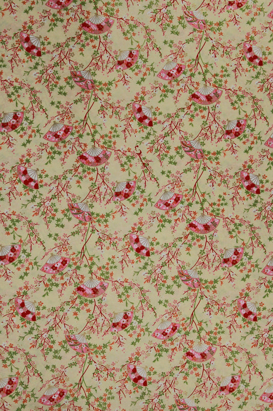 Floral patterned chiyogami paper  with red flowers and green leaves on a beige background