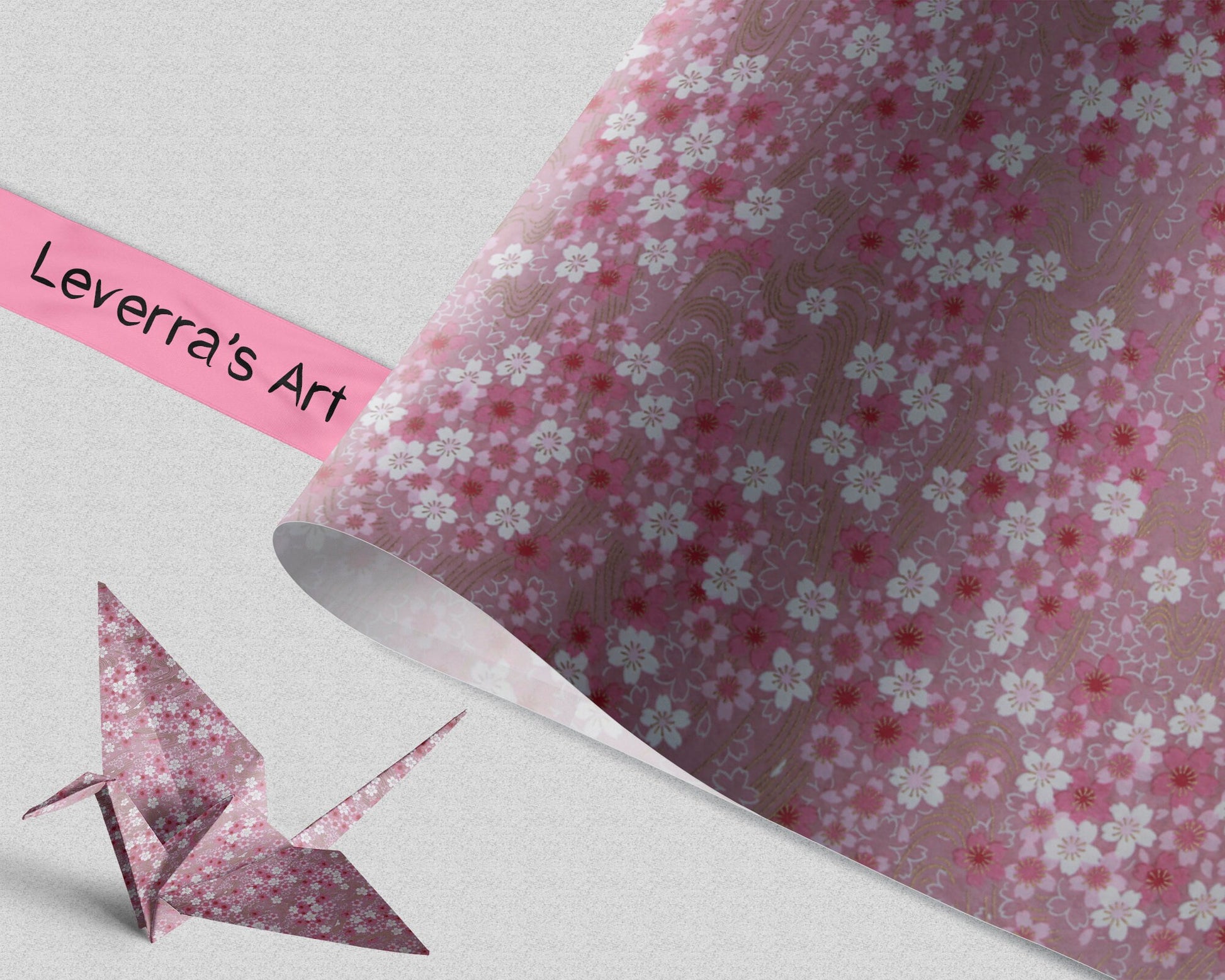 Pink floral patterned chiyogami paper with a folded paper crane and 'Leverra's Art' label.