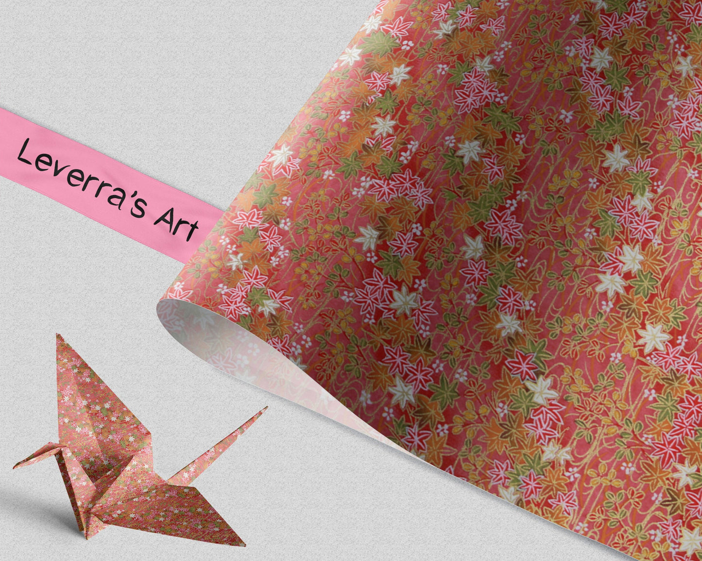 Floral-patterned paper with a folded paper crane and 'Leverra's Art' label.