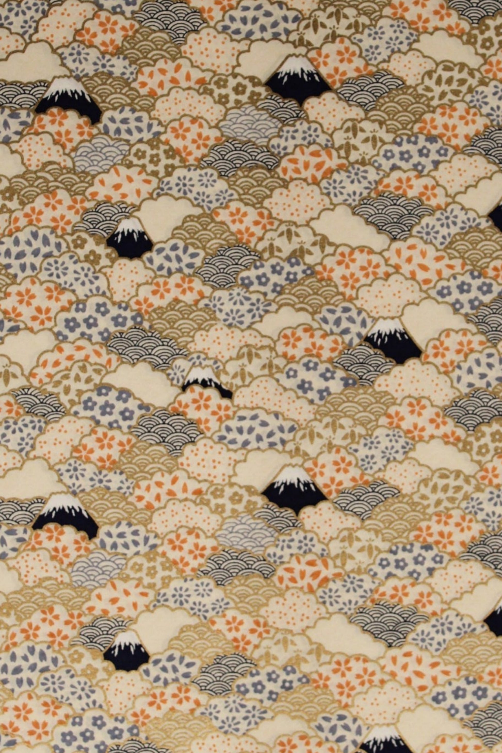 Patterned chiyogami paper with geometric design and black shapes on a beige background
