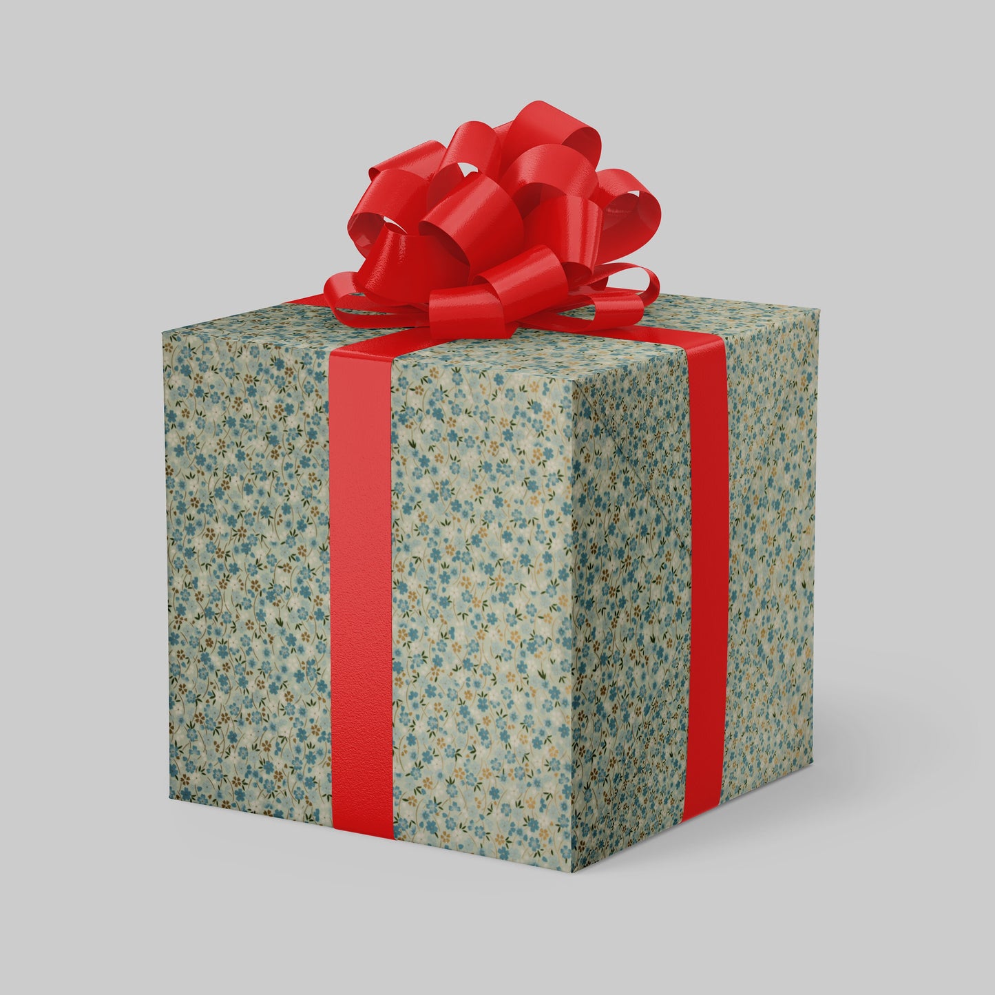 Gift box wrapped with chiyogami paper with floral pattern and red ribbon on a gray background