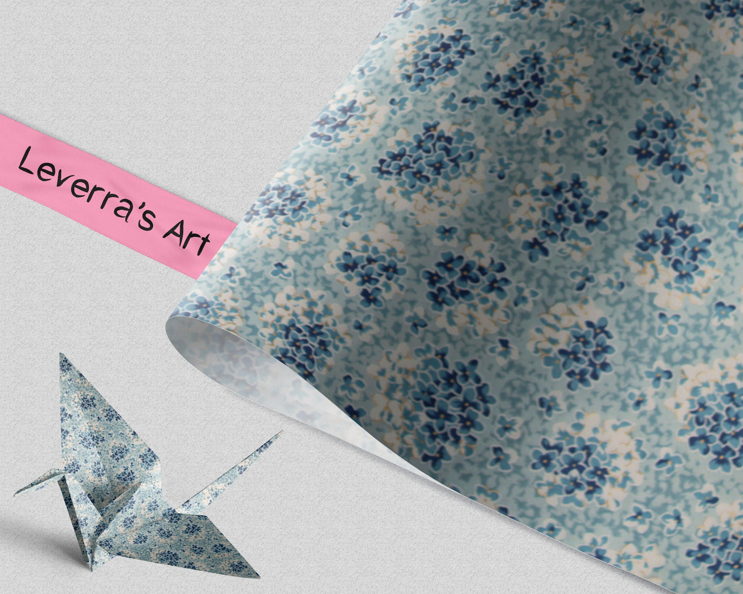 Floral patterned chiyogami paper with a folded paper crane and 'Leverra's Art' label.