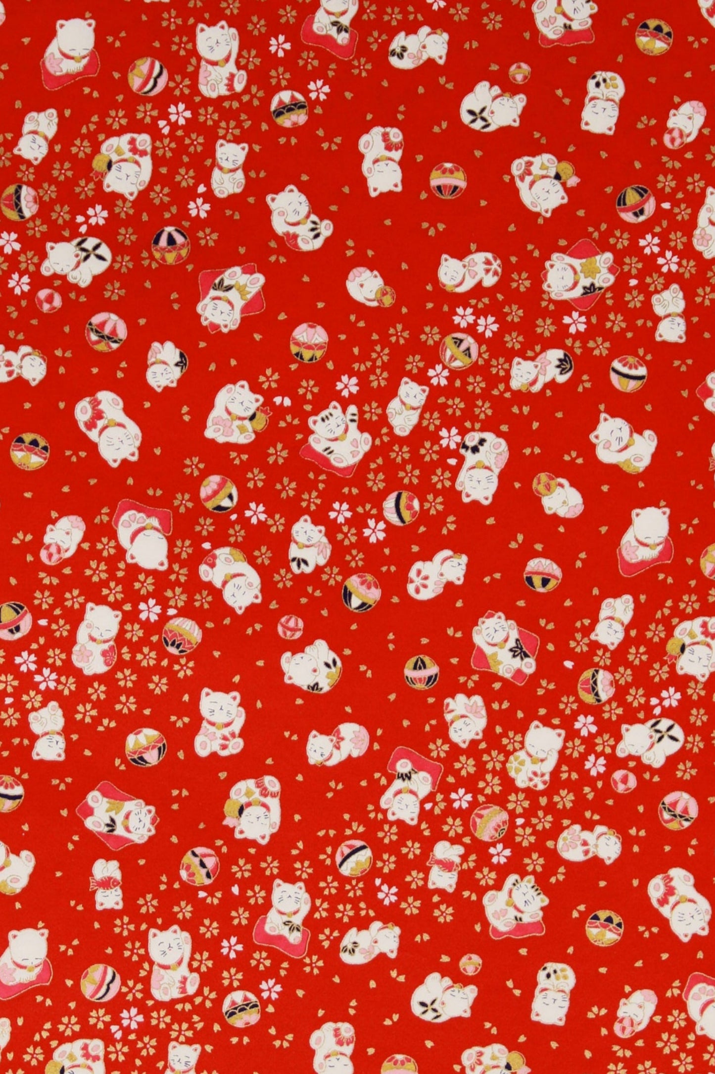 Red chiyogami paper with small white lucky cat patterns