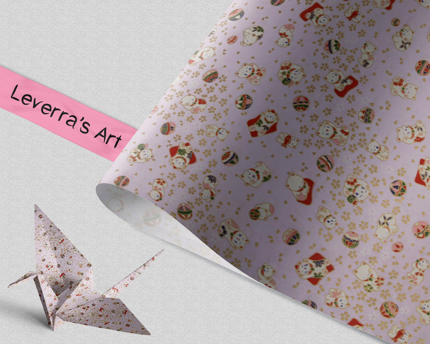 Decorative paper with Santa Claus pattern and a pink strip labeled 'Leverra's Art' on a light gray background.