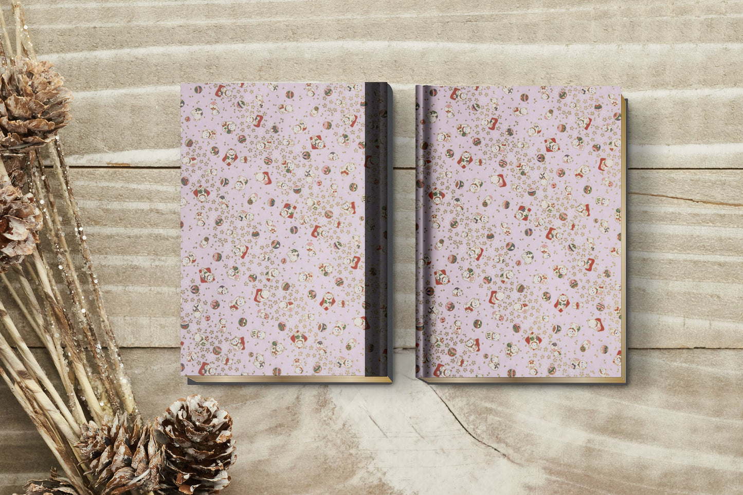 Open notebook with floral pattern on a wooden surface