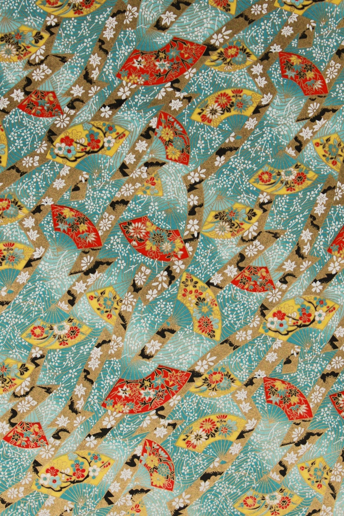 Patterned chiyogami paper with colorful butterfly design on a blue background