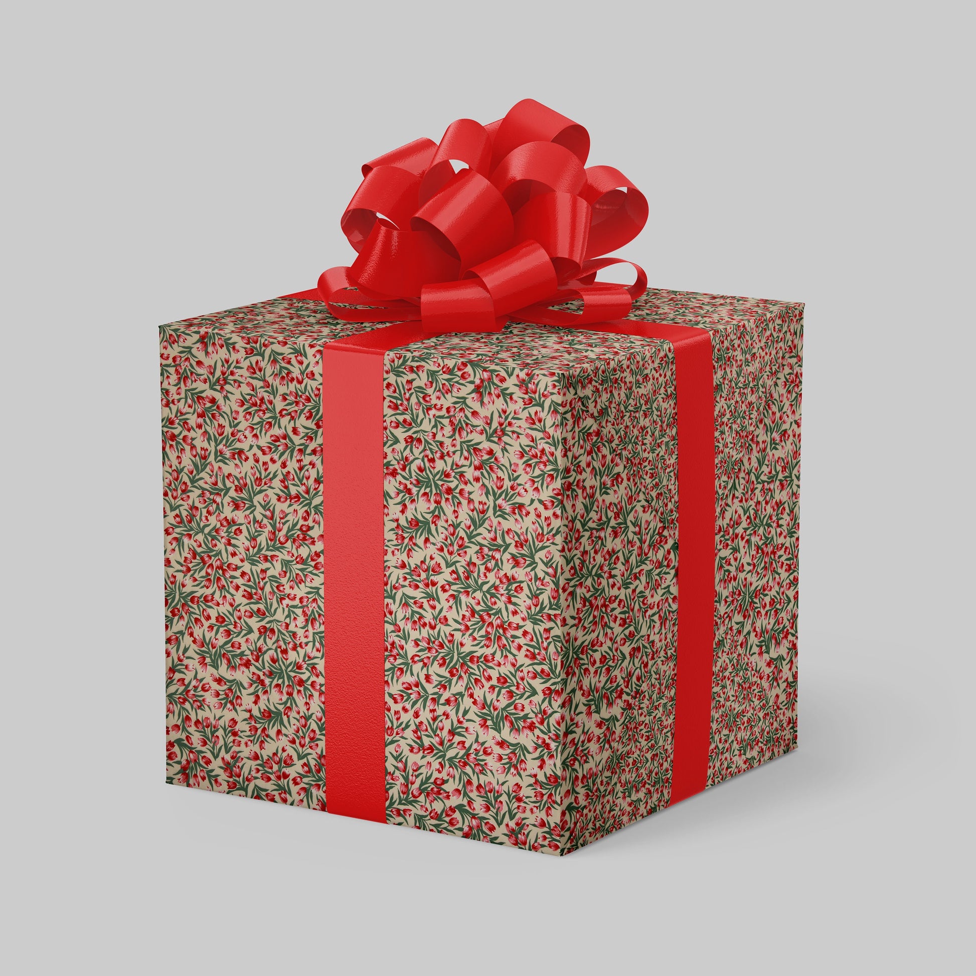 Gift box with floral pattern and red ribbon on a gray background