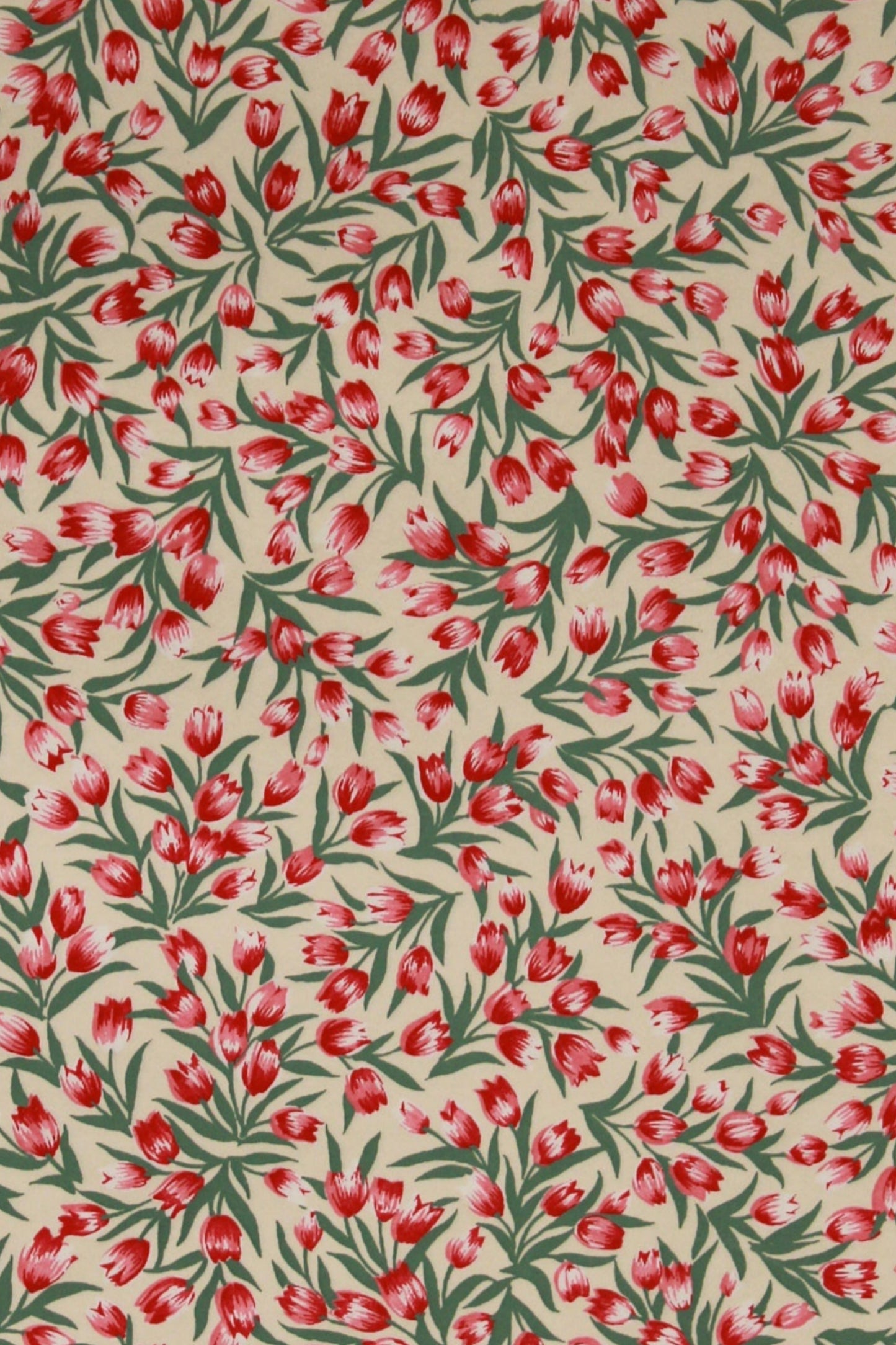 Paper with red floral pattern on a beige background