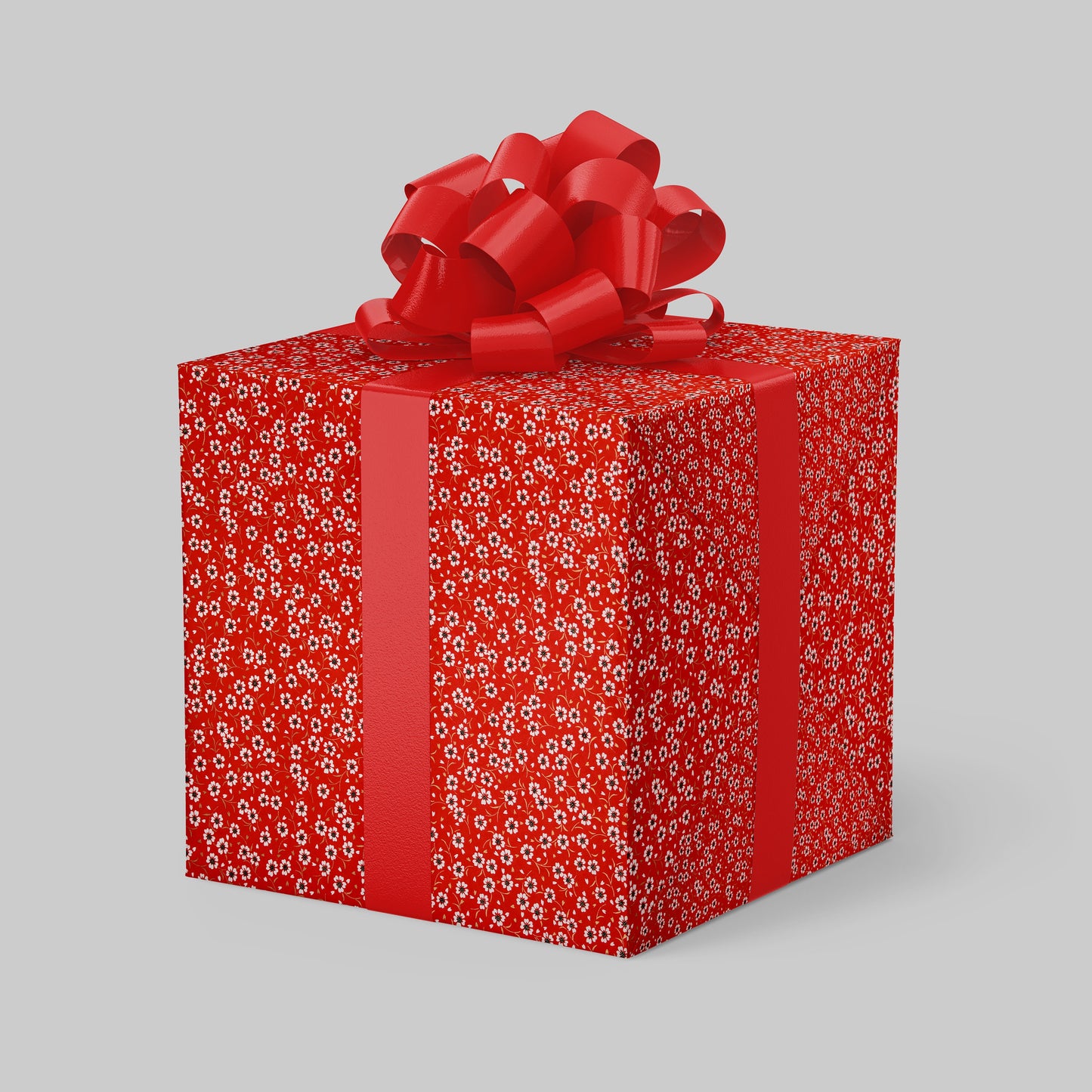 Red gift box with floral pattern and red bow on a gray background