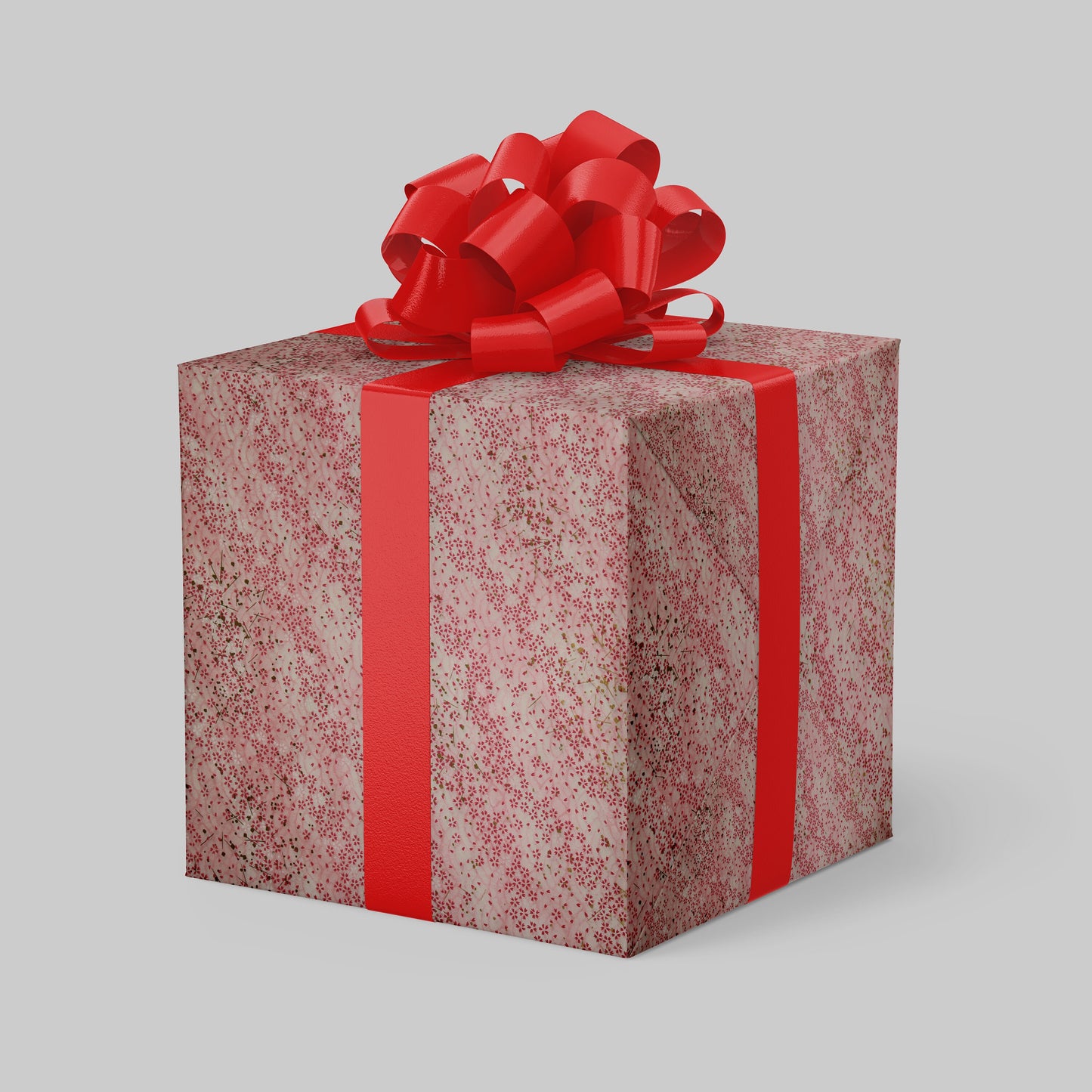 Gift box with red ribbon and bow on a gray background