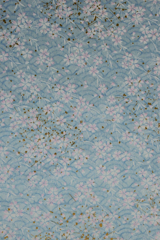 Floral patterned  chiyogami paper with small flowers on a light blue background