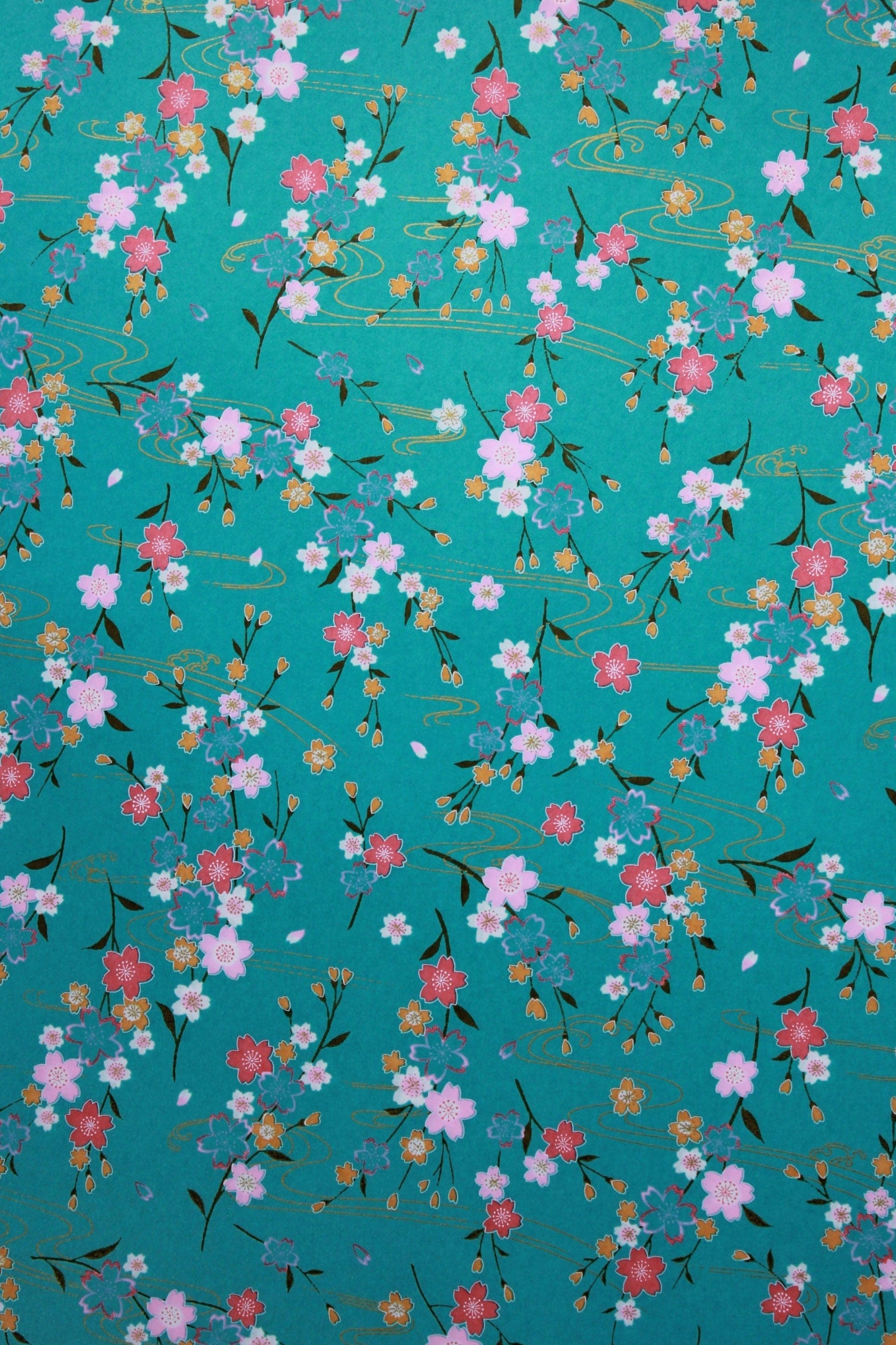 Chiyogami paper with Floral pattern on a teal background