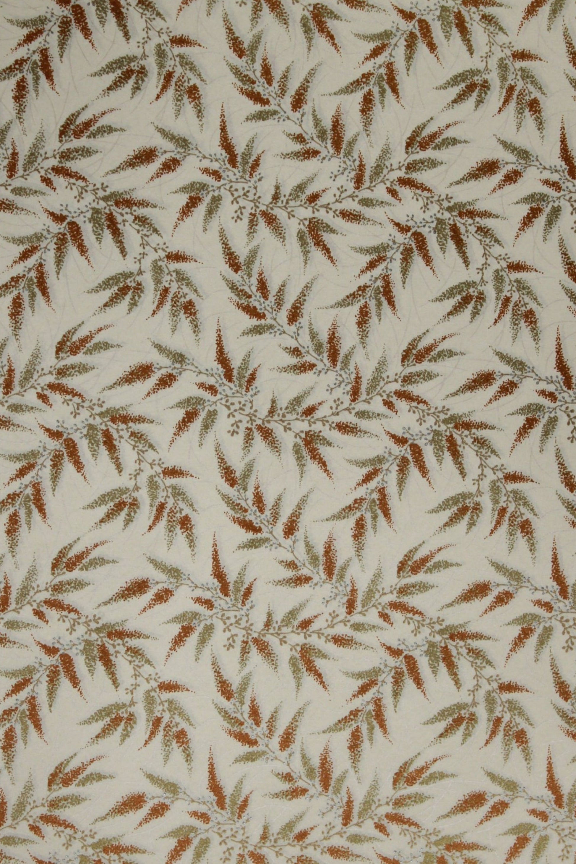 Patterned chiyogami paper with brown leaves on a beige background