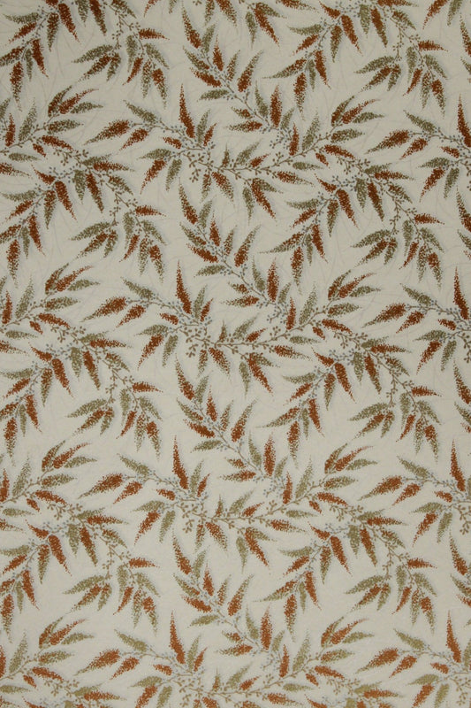 Patterned chiyogami paper with brown leaves on a beige background