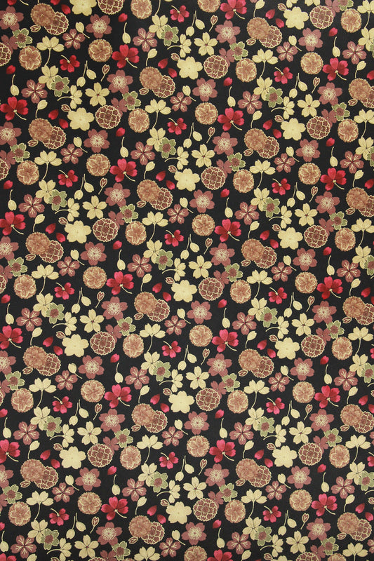 Floral patterned chiyogami paper with various flowers on a black background