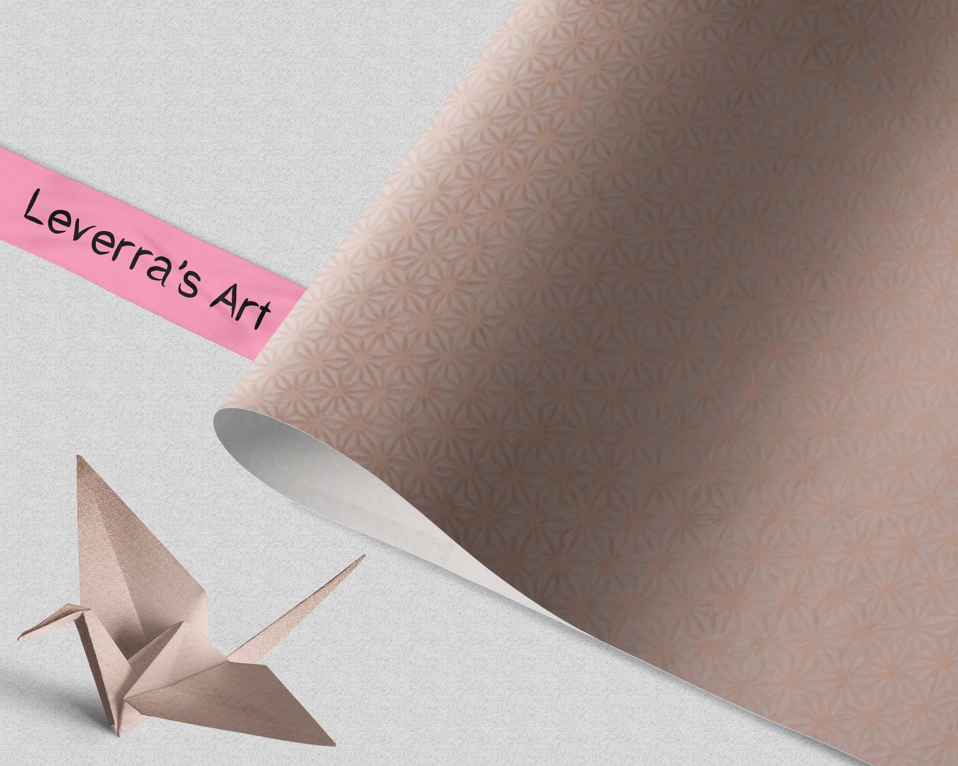 Patterned chiyogami paper with a folded paper crane and 'Leverra's Art' label.