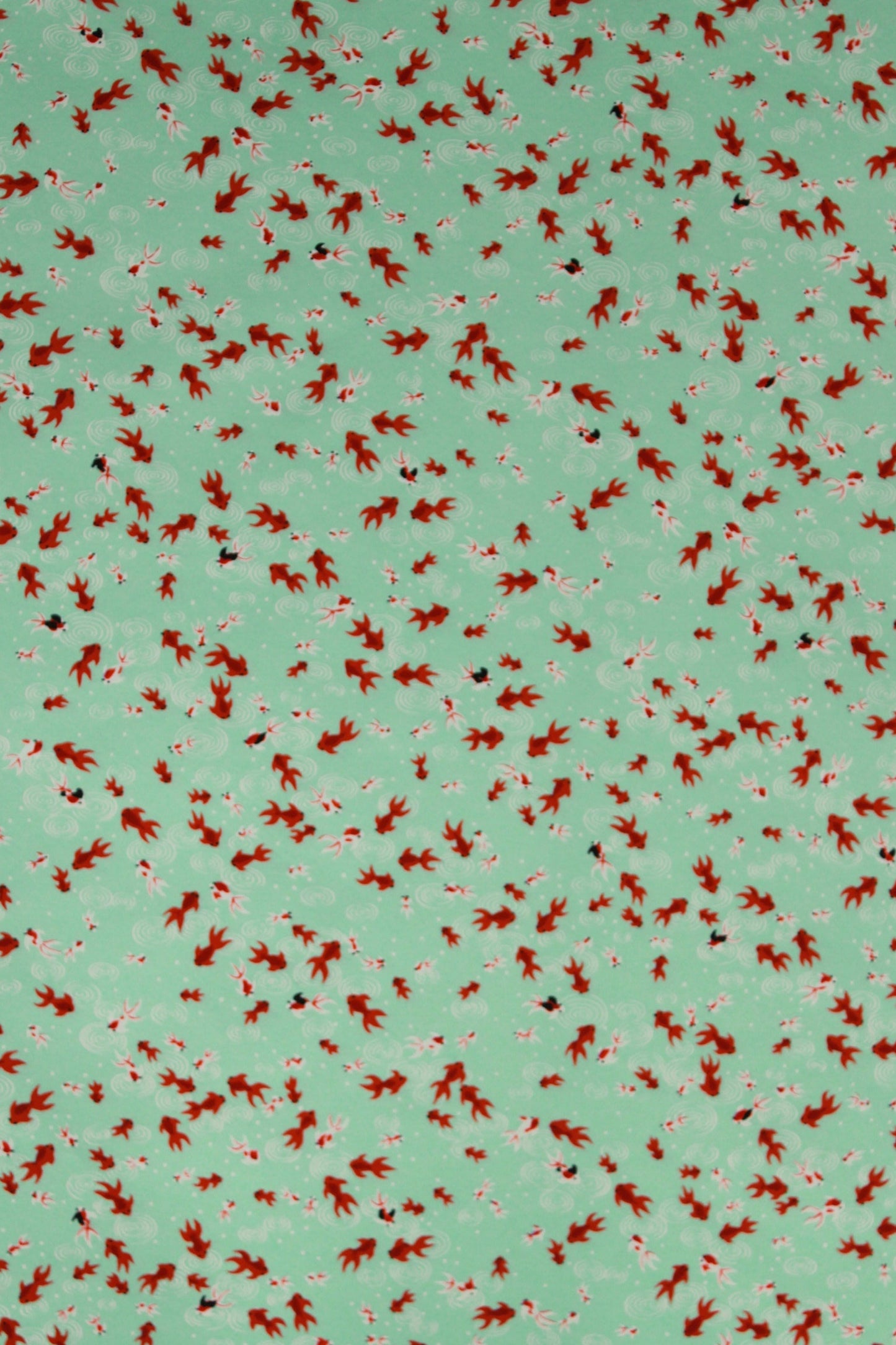 Pattern of red birds on a green background