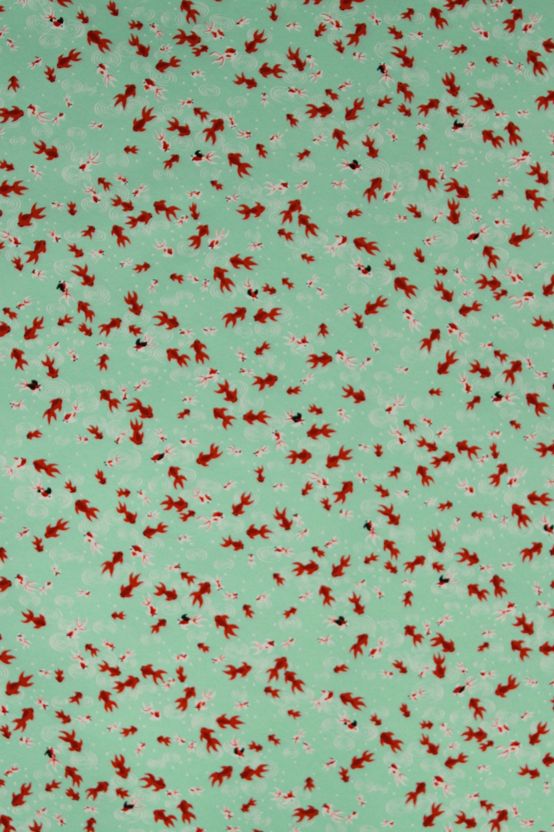 Pattern of red birds on a green background