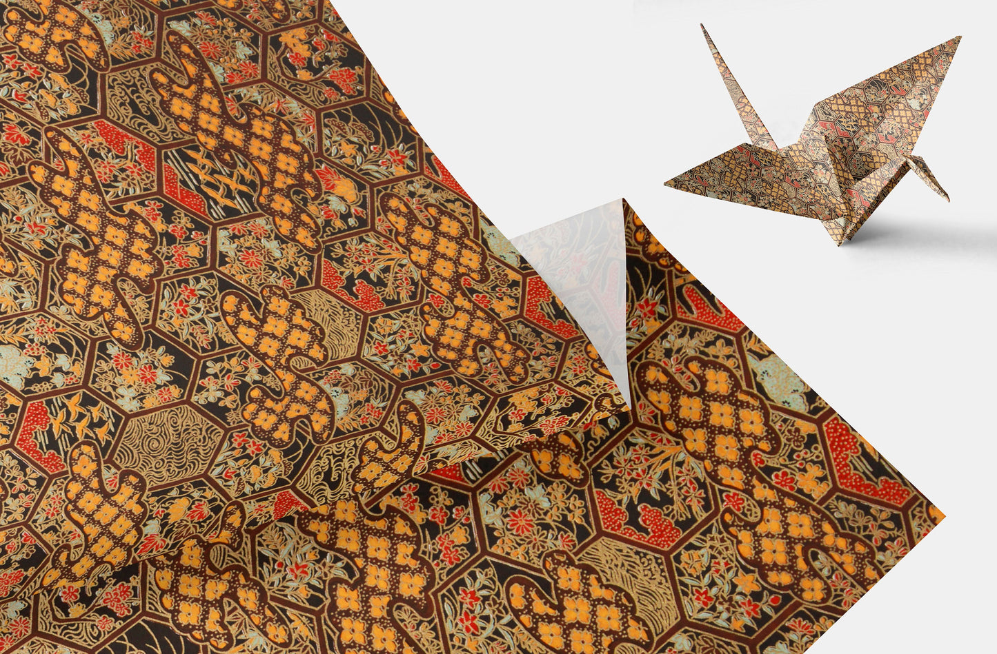Decorative chiyogami paper with intricate patterns and a folded paper crane on a white background