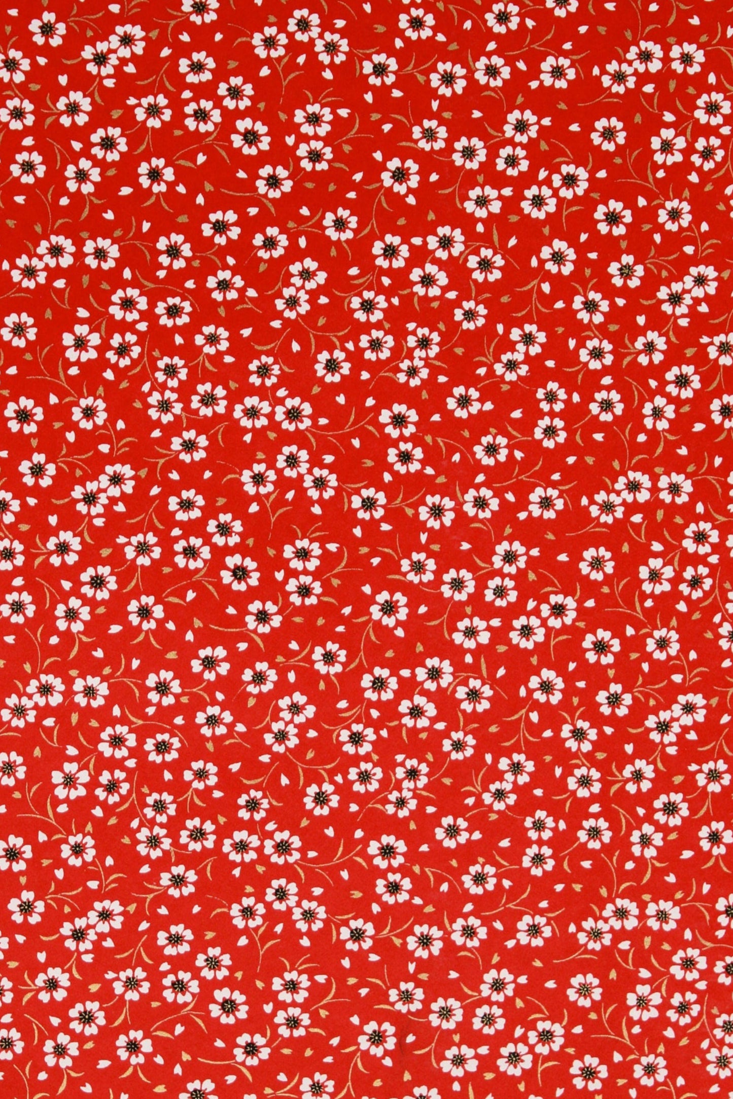 Red  chiyogami paper with small white floral pattern