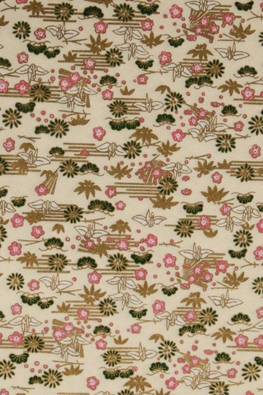 Floral patterned chiyogami paper with small flowers on a beige background