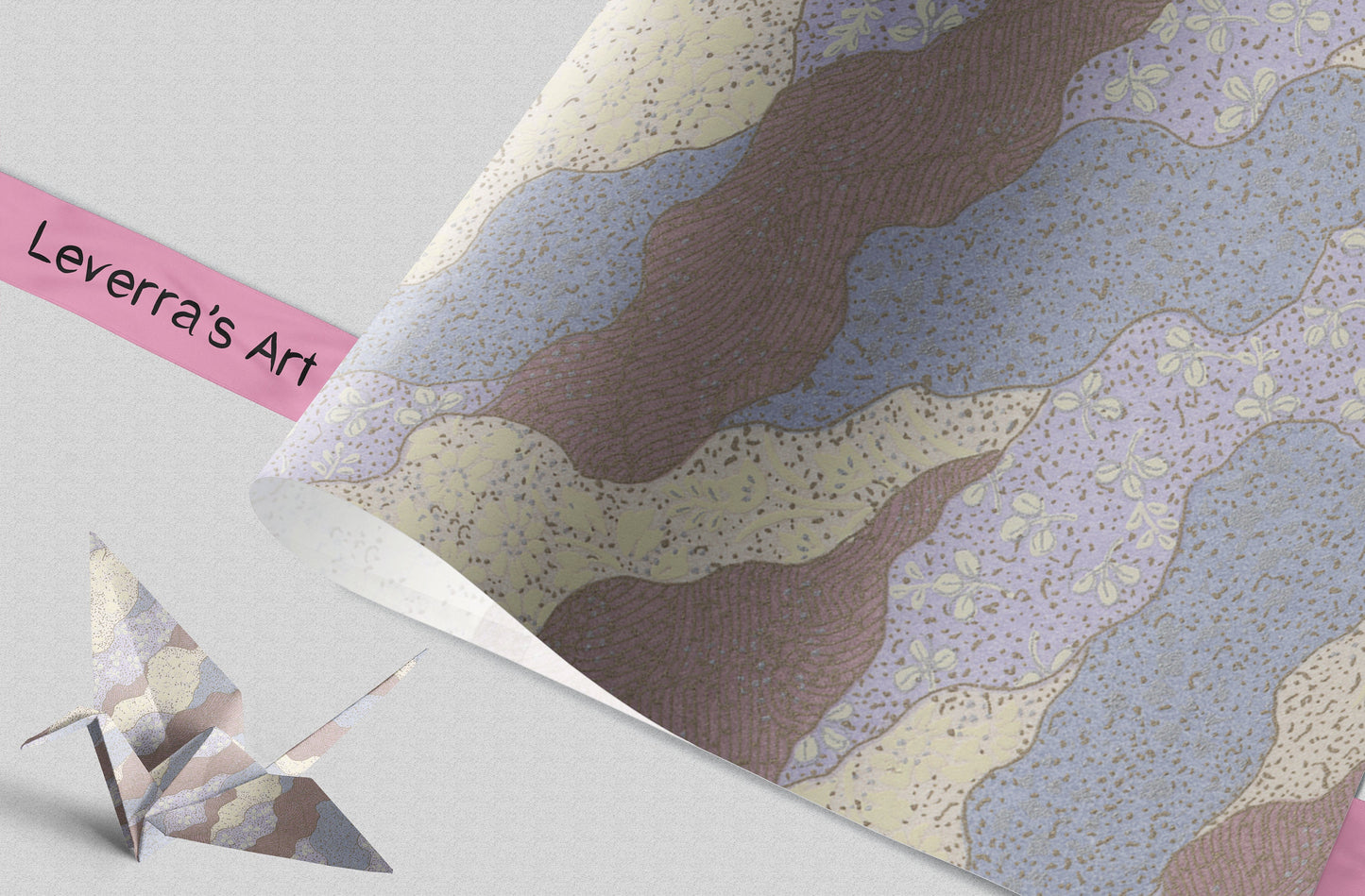 Colorful abstract patterned paper with a silver origami crane on a light gray background, featuring 'Leverra's Art' branding.