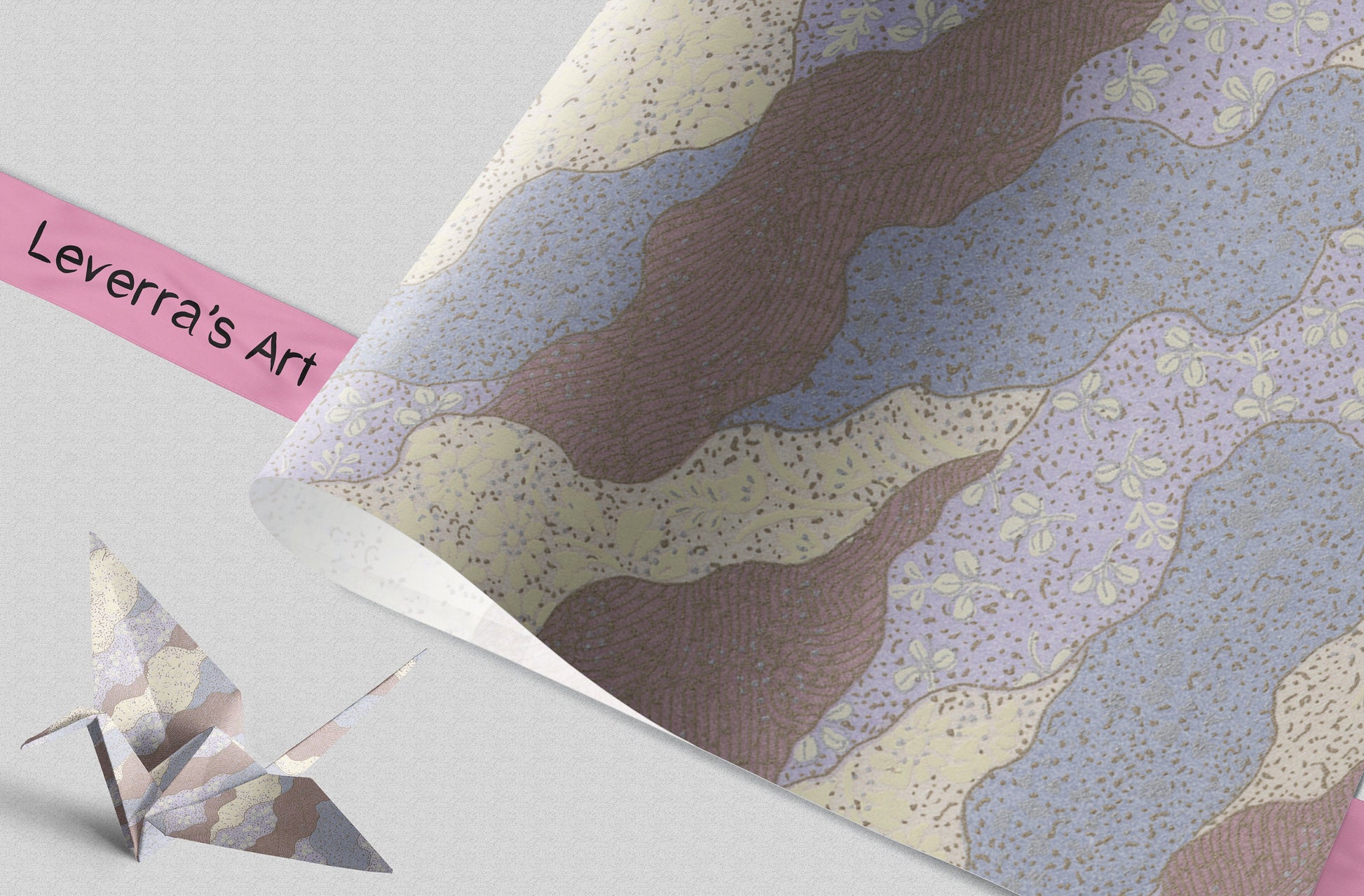 Colorful abstract patterned paper with a silver origami crane on a light gray background, featuring 'Leverra's Art' branding.