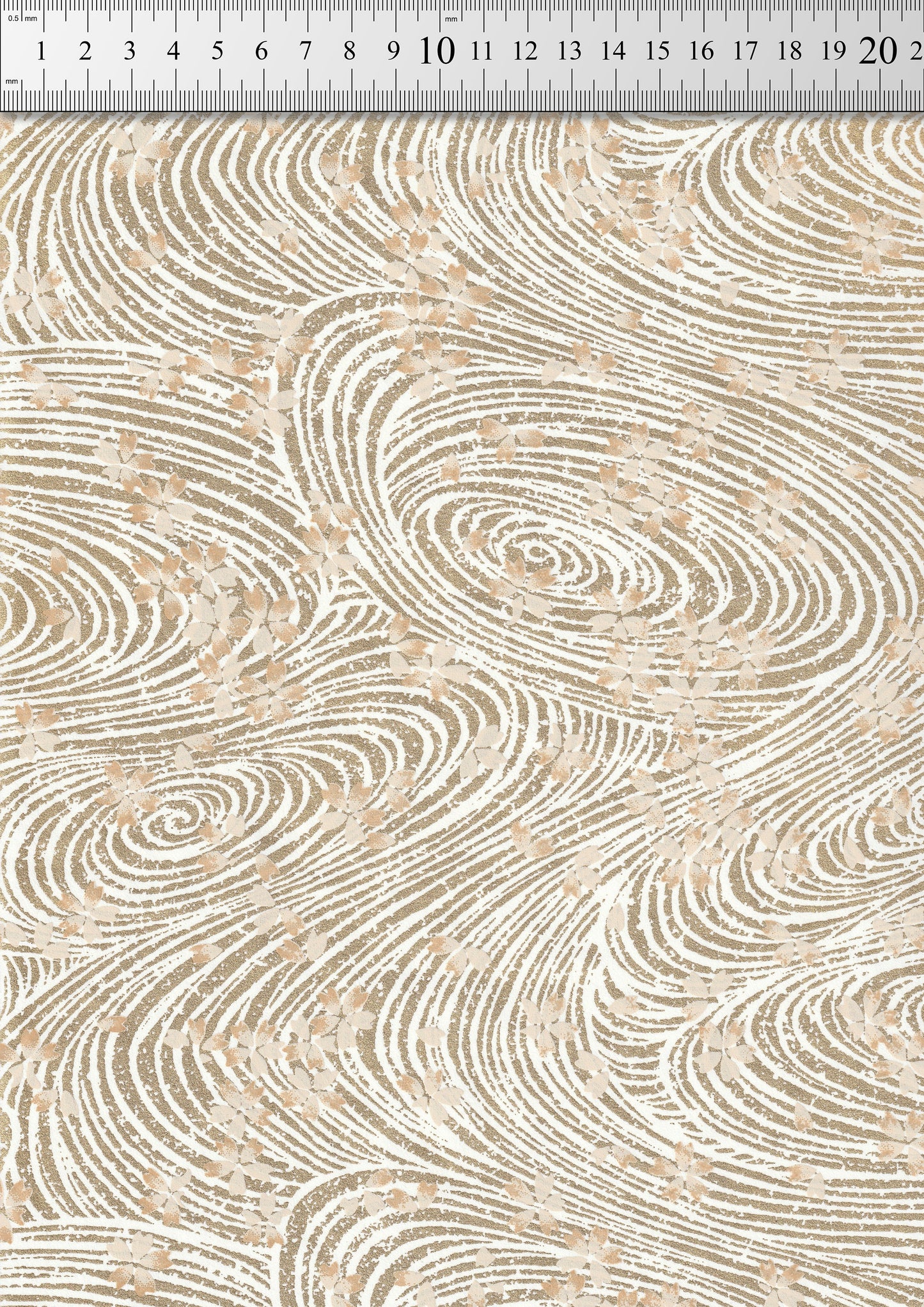 Textured chiyogami paper with wavy pattern and ruler for scale