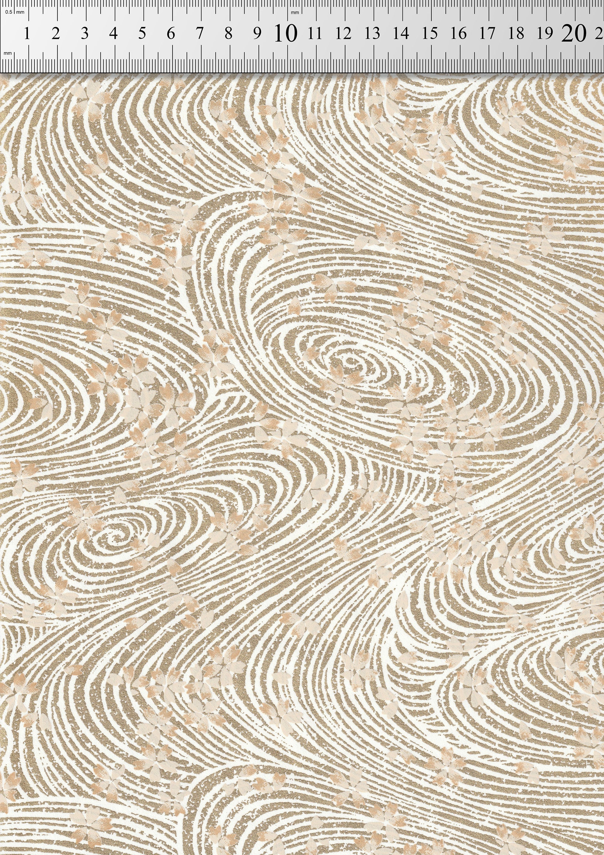 Textured chiyogami paper with wavy pattern and ruler for scale