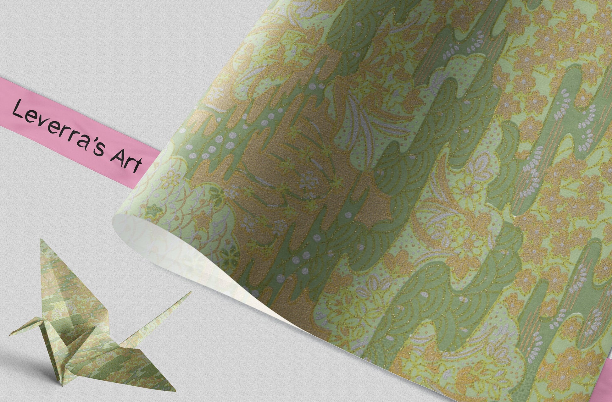 Decorative chiyogami paper with nature-themed design and an origami crane on a light gray background featuring a "Leverra's Art" label.