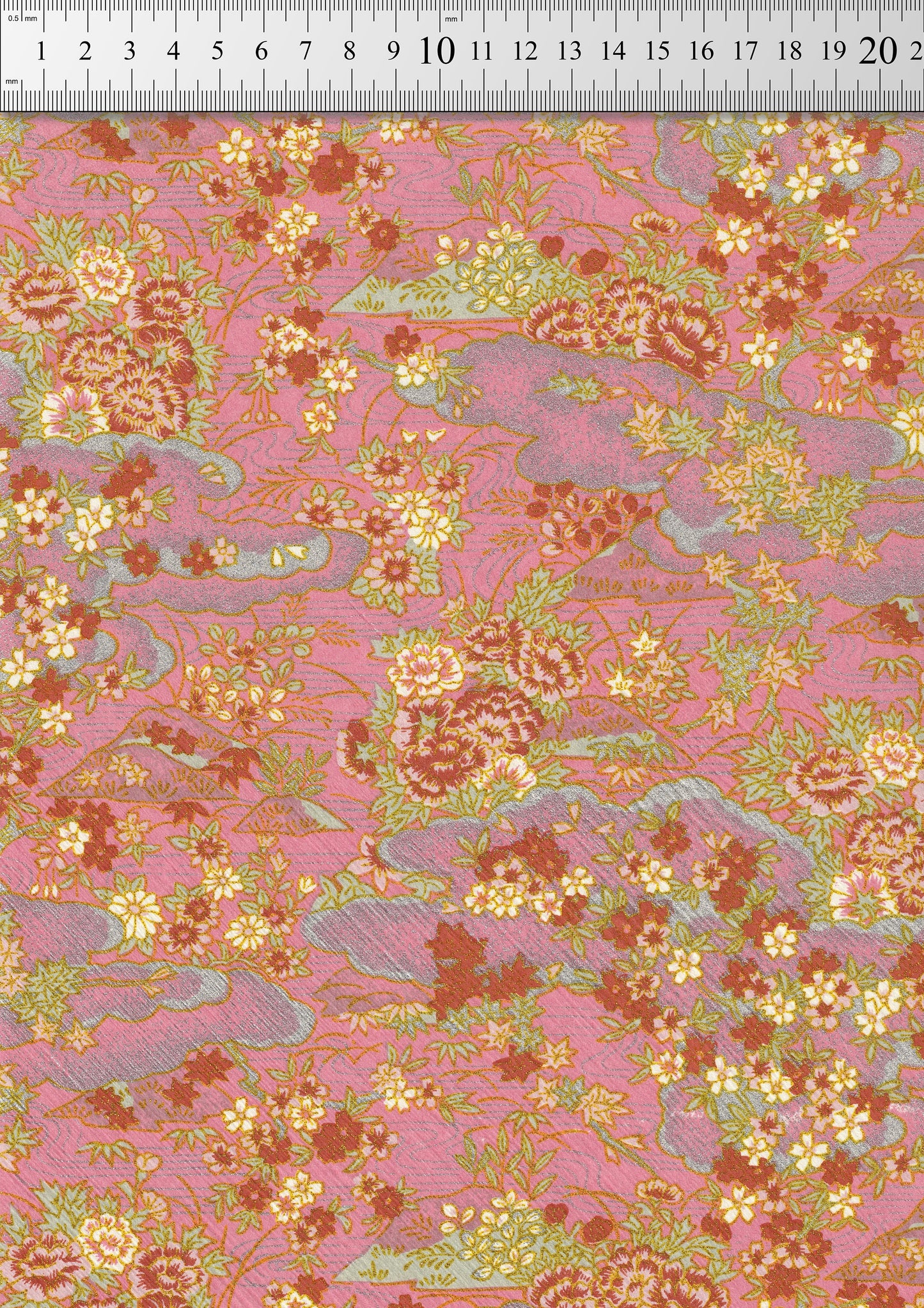 Floral patterned chiyogami paper with a ruler at the top for scale.