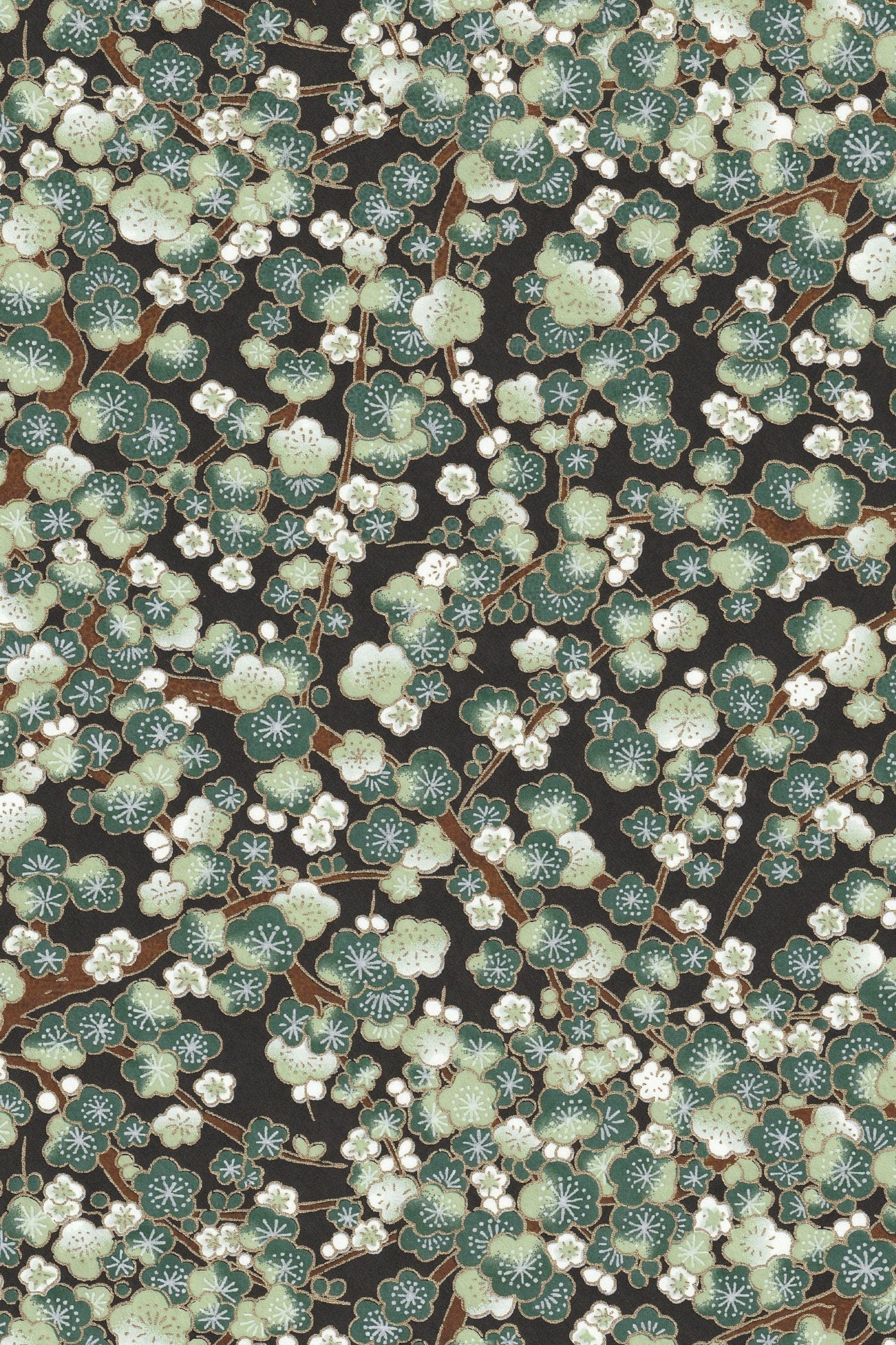 Chiyogami paper with Floral pattern with green leaves and white flowers on a dark background