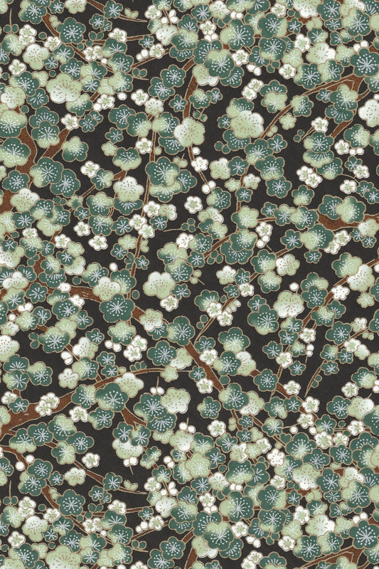 Chiyogami paper with Floral pattern with green leaves and white flowers on a dark background