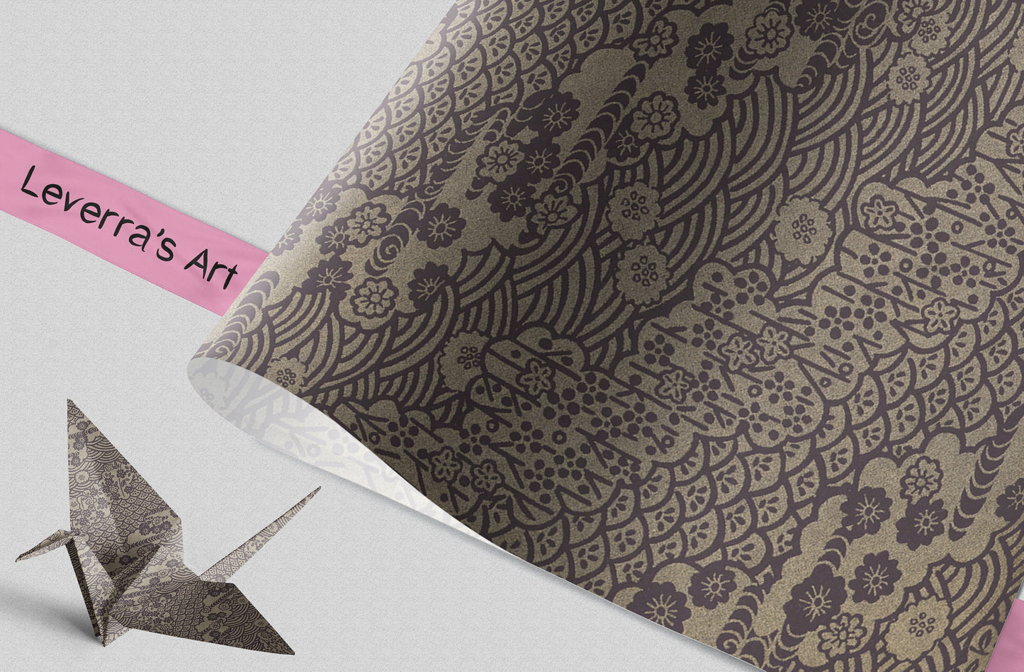 Decorative paper with intricate patterns and a folded paper crane on a light background.