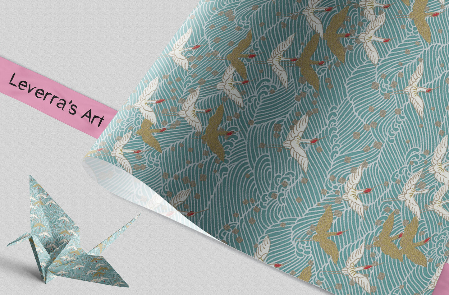 Patterned chiyogami paper with crane design and a folded paper crane on a light gray background, featuring 'Leverra's Art' branding.